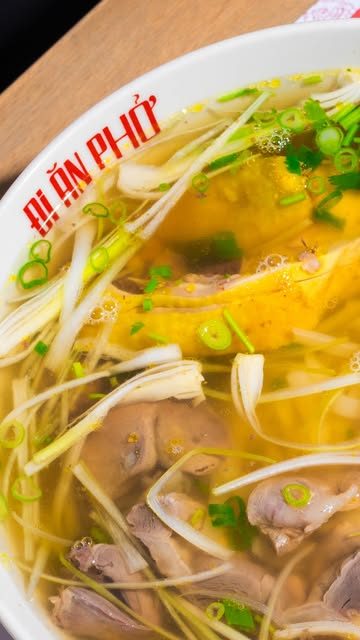 Chicken phở in golden broth
