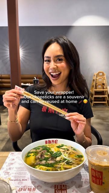A guest enjoying phở